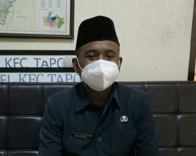 Sekretaris Kecamatan Tapos, Sugino, (Foto: Istimewa)