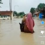Tangkapan layar video, Bidan Desa menerabas banjir demi menolong persalinan di Cirebon.