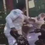 Tangkapan layar video yang menunjukkan pemukulan yang dilakukan seorang siswa terhadap pelajar perempuan.