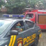 Dokumentasi: Kepala Polsek (Kapolsek) Cimanggung, Kompol Herdis Suhardiman saat mengendarai mobil patroli.