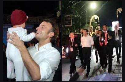 Presiden Macron berbaju putih saat turun dari mobil dan berjalan menyapa warga hingga menggendong anak kecil dan meciumnya di Bali, (15/11). ( tangkapan video Tiktok,/kolase Jabarekspres.com)