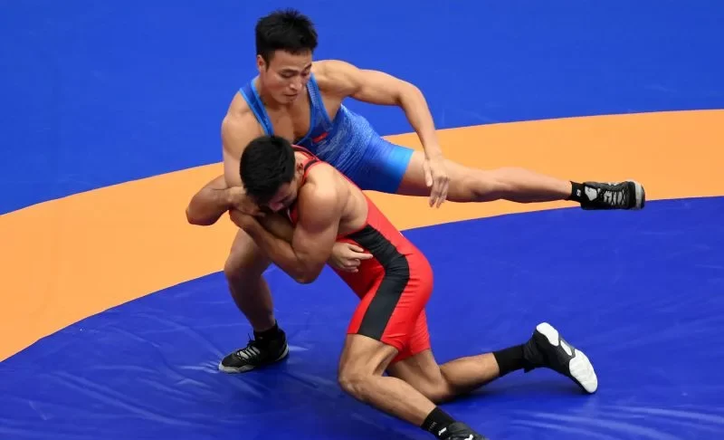 Wrestling Reaches Gold Medal Target on First Day of Competition