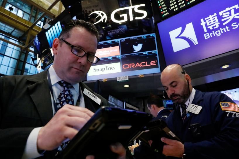 Wall Street Closes, Investors Consider Fed's Next Move