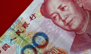 Chinese Yuan Cuts 107 Basis Points to 7.2208 Against the US dollar