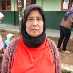 SH (49), salah satu warga yang terdampak pembebasan lahan proyek Tol Cisumdawu seksi 2