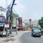 Sebabkan Celaka, Kabel Semrawut di Sekitaran Jalan Depok Bisa Dilaporkan