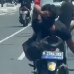 Geger! Video Pria Mengendarai Motor Sambil Rebahan di Jalan Margonda Raya