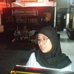 Murnia Dwi Puteri (33), istri dari oknum polisi, saat melaporkan sang suami ke Polres Sukabumi Kota akibat KDRT.