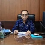 Inspektur Kota Banjar Agus Muslih MMKes QGIA di ruang kerjanya.