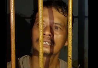 Wajah Tar (51) pelaku Mutilasi Ciamis saat sudah ditangkap polisi.