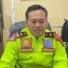 Kasatlantas Polresta Bandung, Kompol Galih Apria saat memberikan keterangan terkait pengambilan raport untuk Ilham. Foto Agi Jabar Ekspres