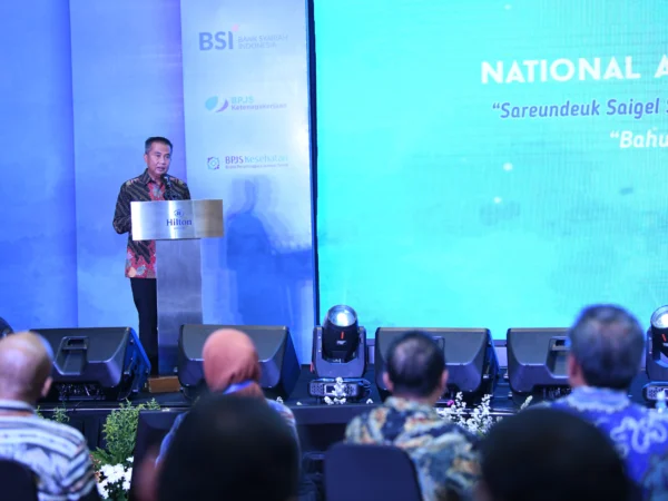 Penjabat Gubernur Jawa Barat Bey Machmudin memberikan sambutan pada acara National Anti Fraud Conference 2024 di Hotel Hilton Bandung, Kamis (5/9/2024).(Foto: Biro Adpim Jabar)