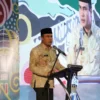 Kepala Bapenda KBB, Dudi Prabowo saat menghadiri giat pelan panutan pajak di Padalarang, Bandung Barat. Dok Bapenda KBB