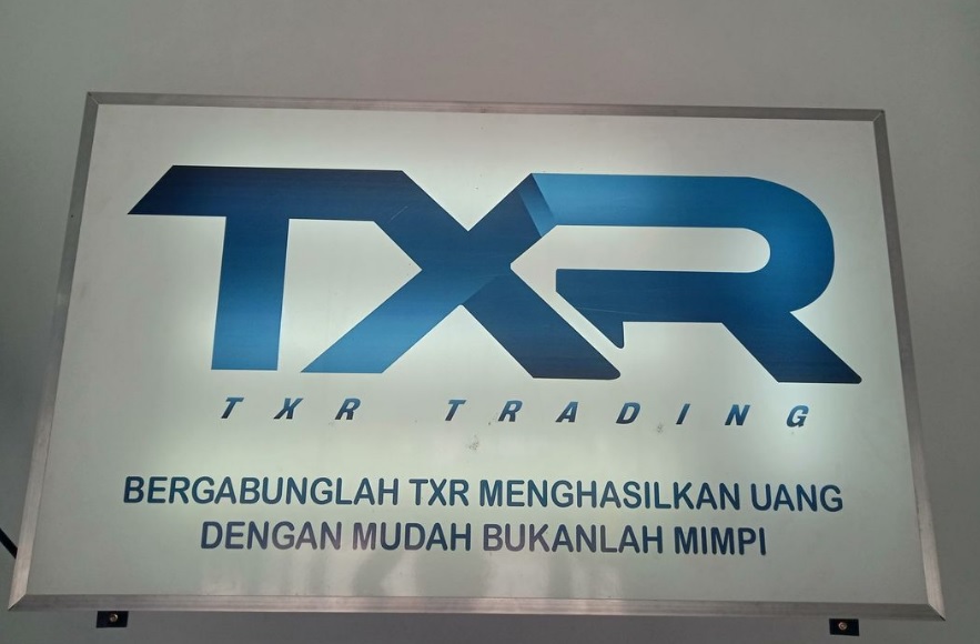 Aplikasi TXR Trading yang diduga mengalami SCAM hari ini.