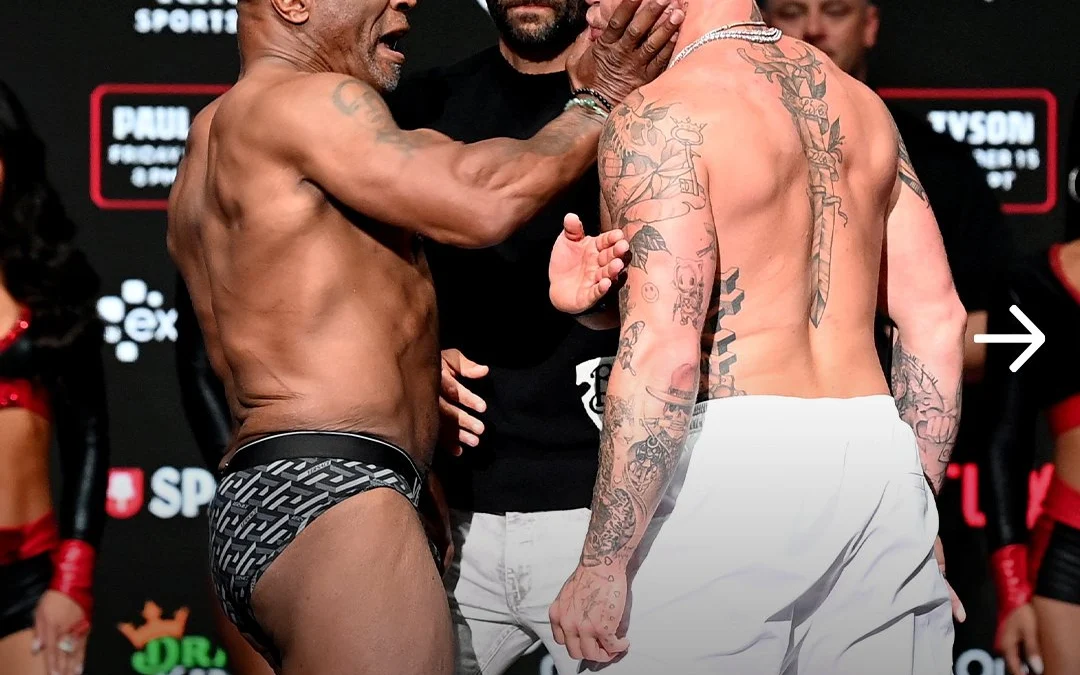 Mike Tyson mengejutkan publik dengan tampar ke Jake Paul di sesi timbang badan, sehari sebelum pertarungan kontroversial di Arlington, Texas.