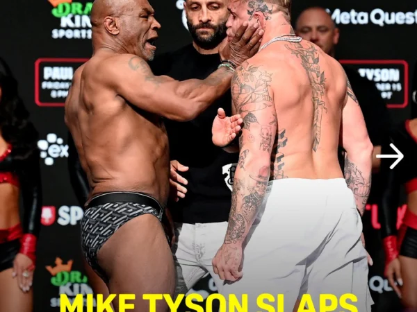 Mike Tyson mengejutkan publik dengan tampar ke Jake Paul di sesi timbang badan, sehari sebelum pertarungan kontroversial di Arlington, Texas.