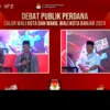 Tangkapan layar debat publik Pilkada Kota Banjar menampilkan paslon walikota dan wakil walikota Sudarsono-Suriana (kiri), dan Paslon Bambang Hidayah-Dani Danial Mukhlis (kanan), yang diselenggarakan KPU Banjar pada Selasa 5 November 2024 malam.