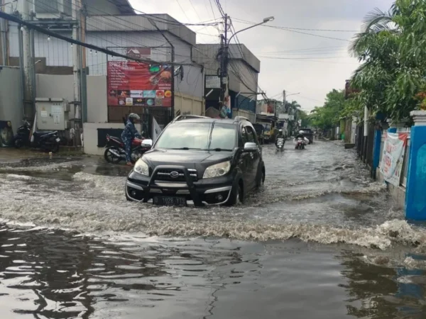 Salah satu titik banjir yang kerap terjadi di wilayah Cingised, Cisaranten Endah, Kota Bandung (Sadam Husen / JE)