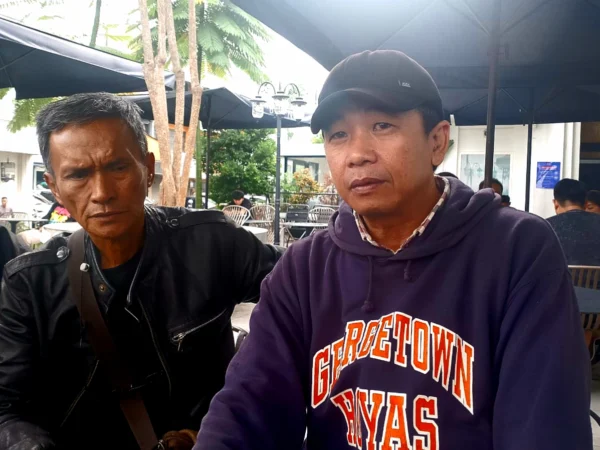 Ketua Komite Konstituen Kota Bandung Yadi Suryadi (kanan