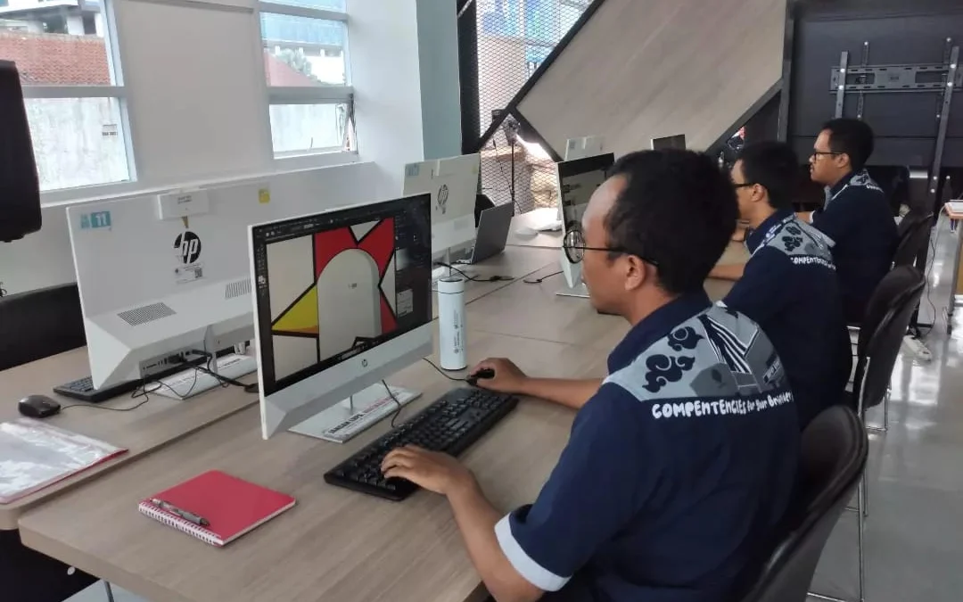 Ilustrasi sejumlah peserta pelatihan di BBPVP Bandung sedang belajar design grafis.