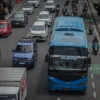 Ilustrasi mudik: Bus Damri melintas di Jalan Asia-Afrika, Kota Bandung, Jum'at (27/12). Foto: Dimas Rachmatsyah/ Jabar Ekspres