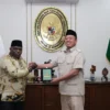 Menteri ATR/Kepala BPN, Nusron Wahid, dan Menteri HAM, Natalius Pigai saat koordinasi di Ruang Kerja Menteri ATR/Kepala BPN pada Rabu (15/01/2025).