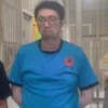 Tampang dokter PPDS pelaku pelecehan di RSHAS saat ditangkap oleh polisi.