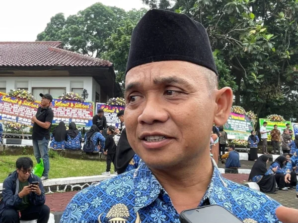 Empop Hasbulloh seorang honorer di Kabupaten Bogor yang dilantik jadi PPPK. (Foto/Sandika Fadilah)